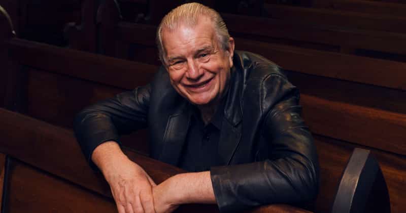 Rev. Bill Crews in pews of his Ashfield Uniting Church.