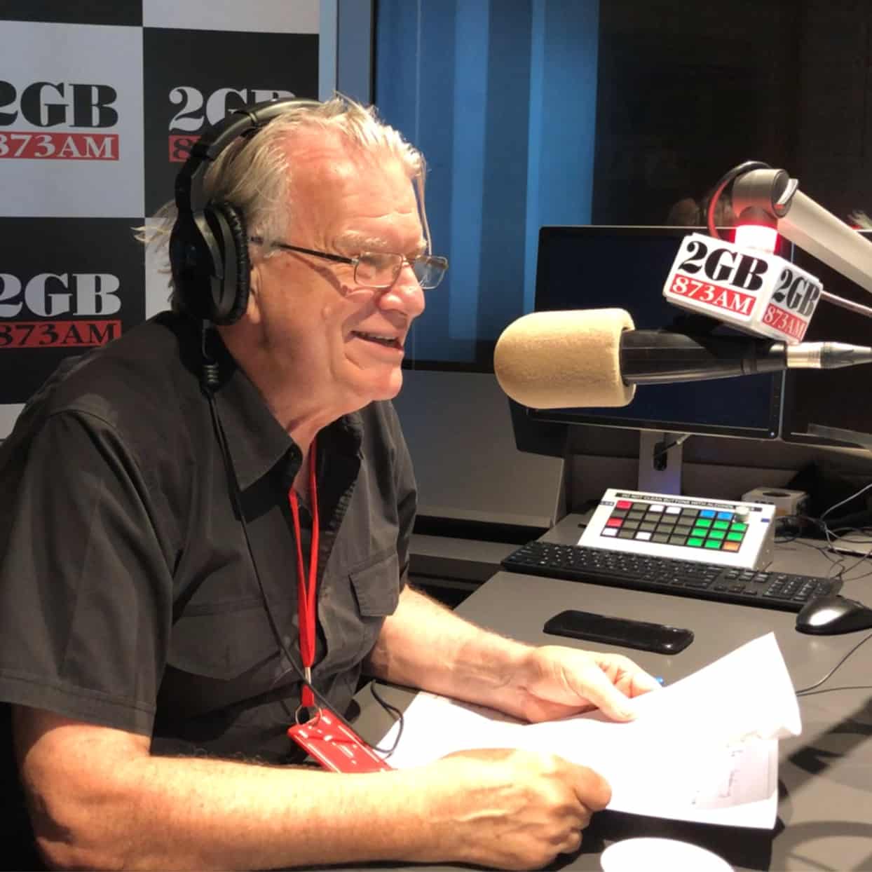 Rev. Bill Crews behind the microphone at radio station 2GB in Sydney.