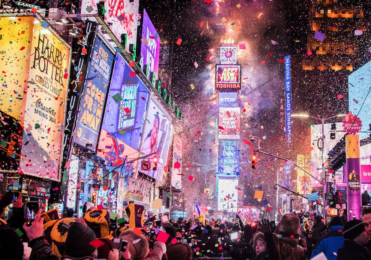 Crowds celebrate New Year's Eve in New York City.