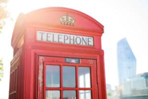 Making a connection via a phone box in Hertford, UK.
