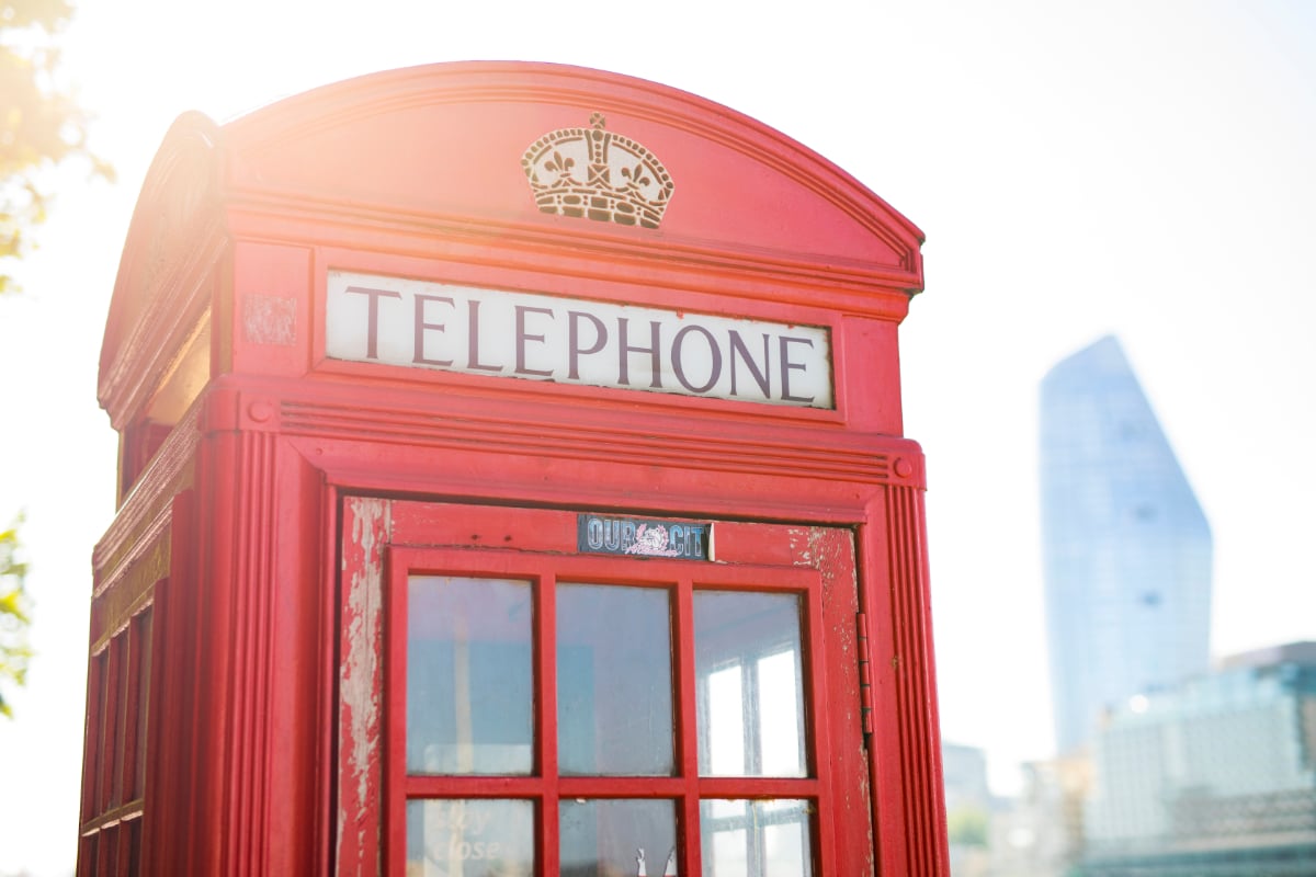 Making a connection via a phone box in Hertford, UK.