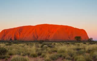 Uluru at sunset inevitably makes us consider Australia Day in 2023.