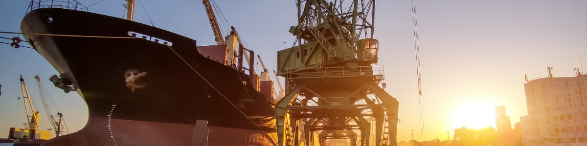 A cargo ship being loaded.