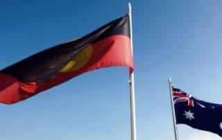 Aboriginal and Australian flags - will the yes vote succeed in the referendum.